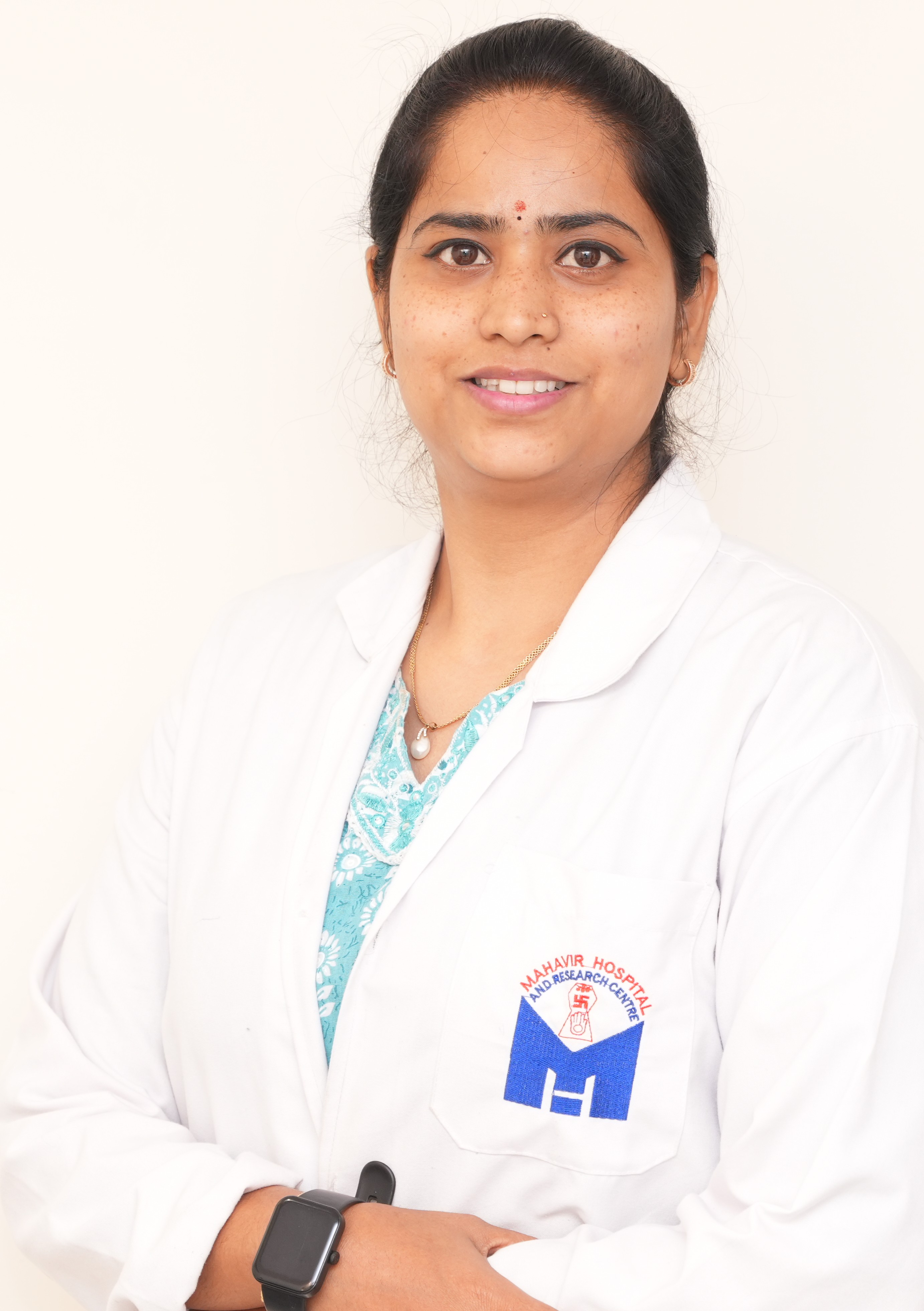 Dr. Dr Radhika